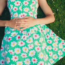 Woman lying in the grass considering being an egg donor | Tennessee Reproductive Medicine | Chattanooga, TN