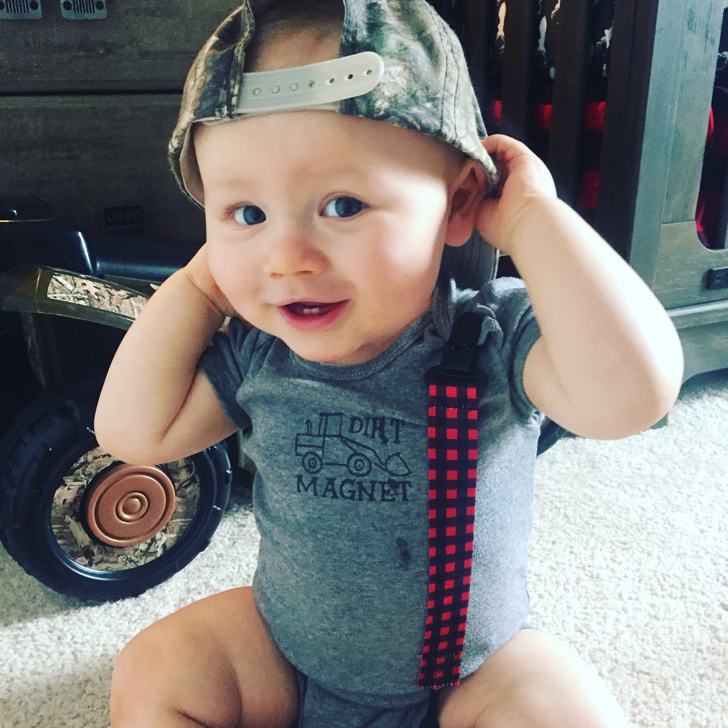 Baby wearing backwards hat Baby photo album TRM Tennessee