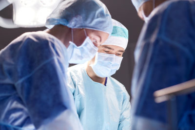 robotic surgery & minimally invasive surgery | Tennessee Reproductive Medicine | photo of group of surgeons in operating room 